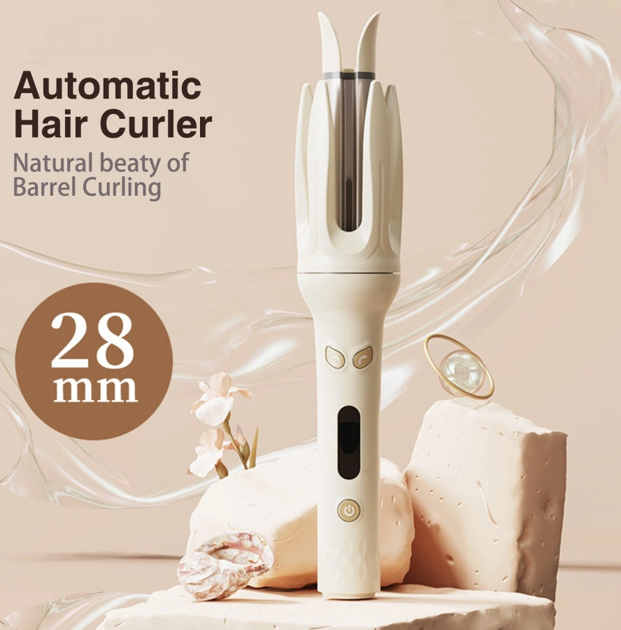 White automatic hair curler with text on a beige background